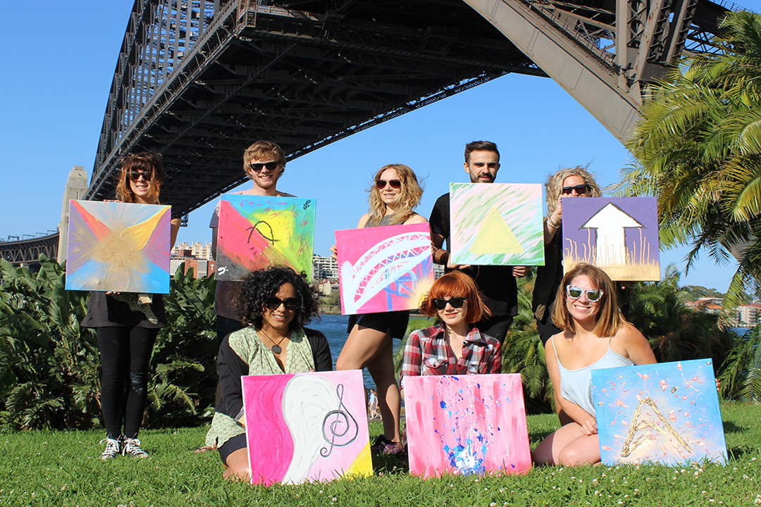 group-of-people-with-paintings group of people with paintings