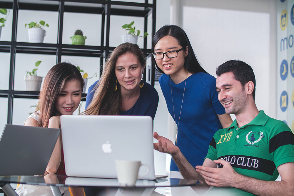 Employees engaged in a team building activity that enhances communication
