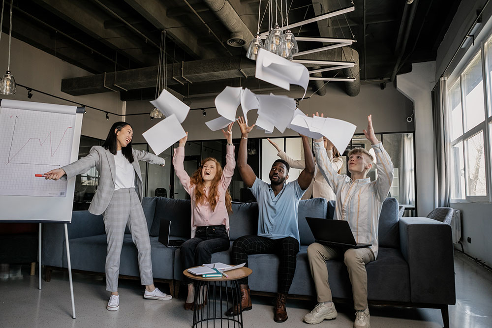 Team members communicating effectively during a team bonding activity to improve productivity