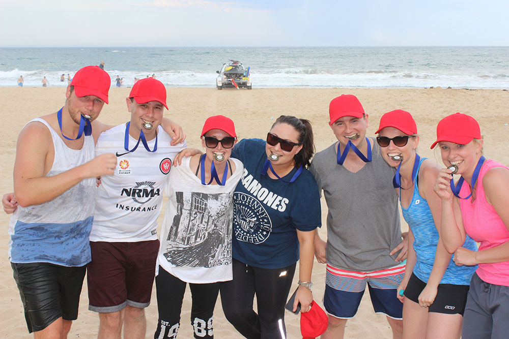 Team building activity on a beach