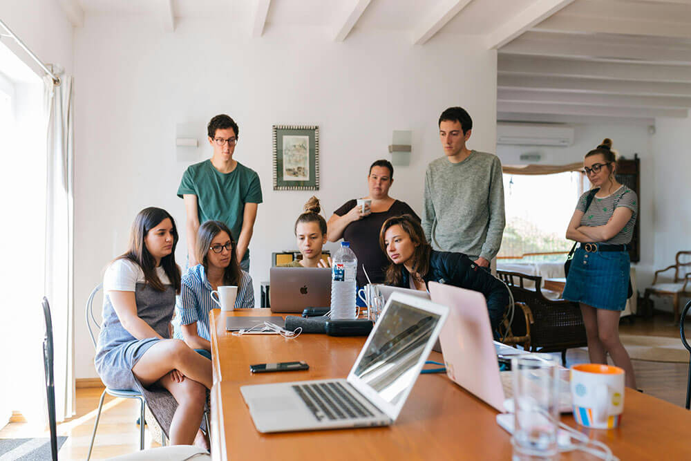 Inclusive and diverse team collaborating on a creative project