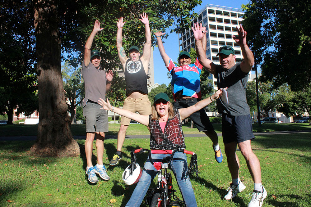 Corporate team building activity where the team assembles bicycles for charity